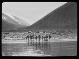 Image of Inuit men and boys at water's edge